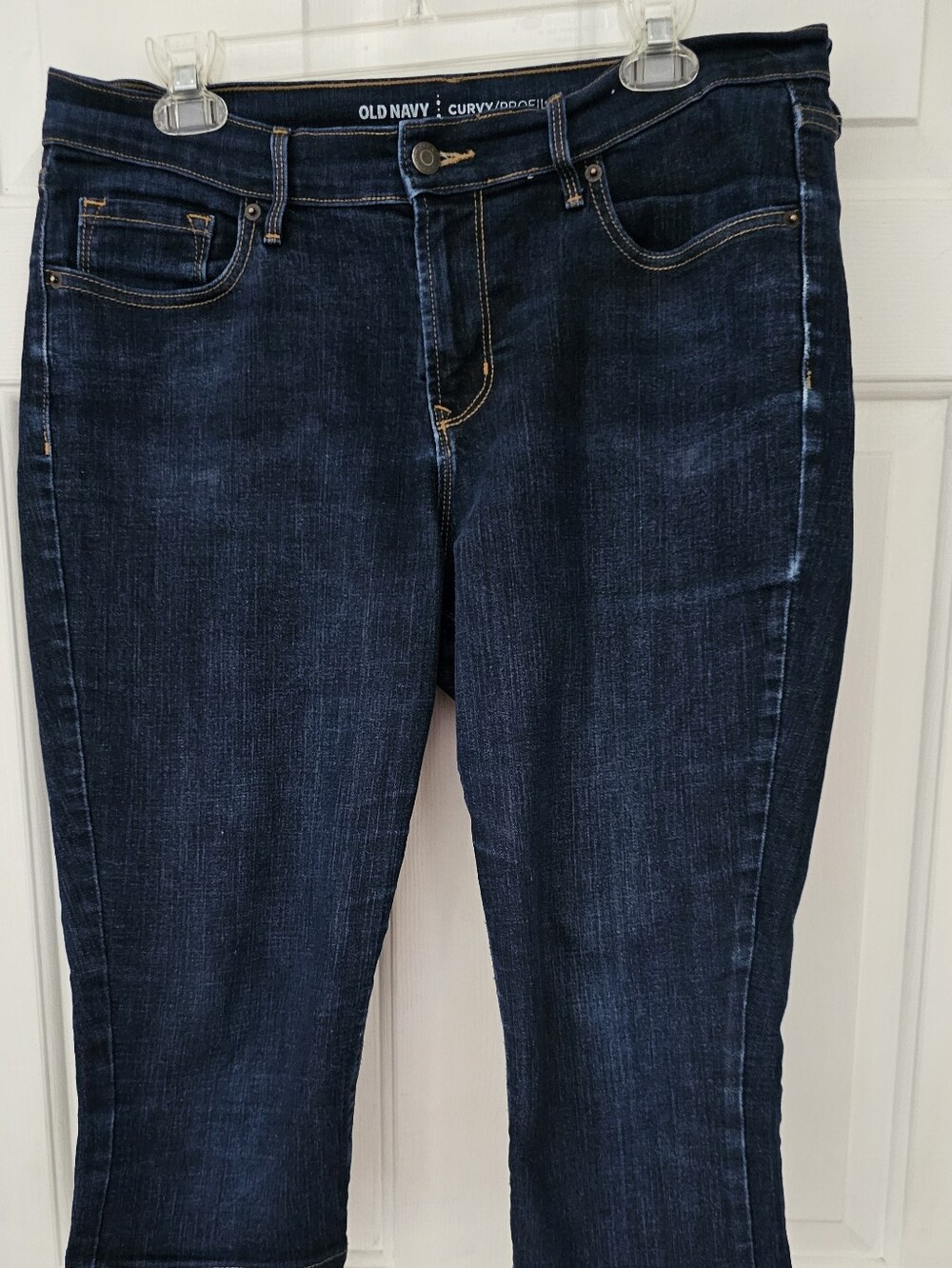 Old Navy Curvy Mid-Rise Capri Jeans in Dark Blue Wash.